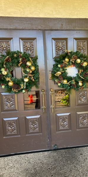 Christmas wreaths on front double doors