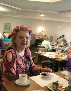 pretty lady with Easter garland in la posada dining room