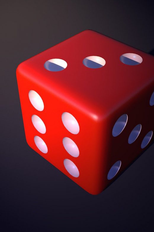 red dice on black background
