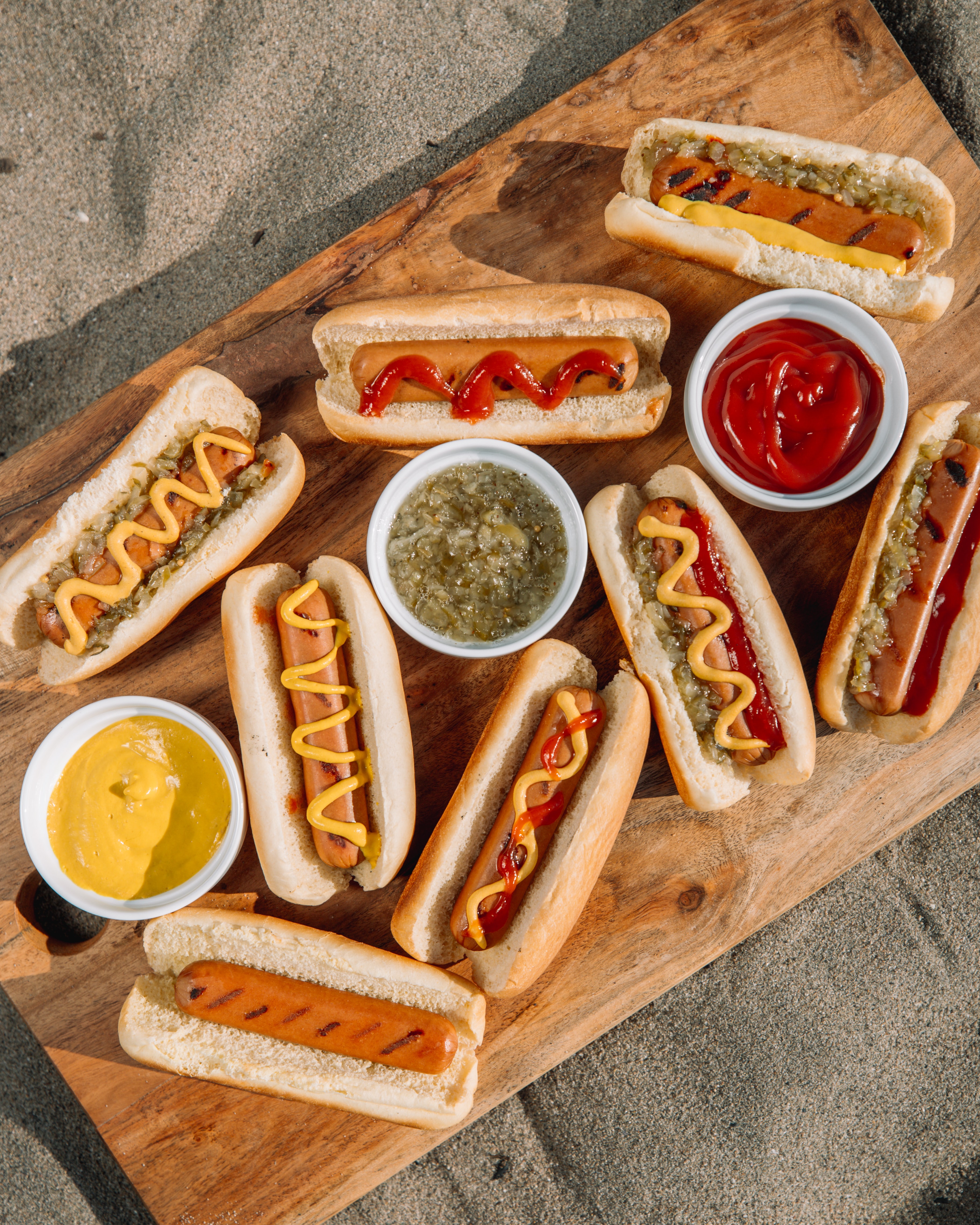 hot dog assortment on a board by ball park brand on unsplash