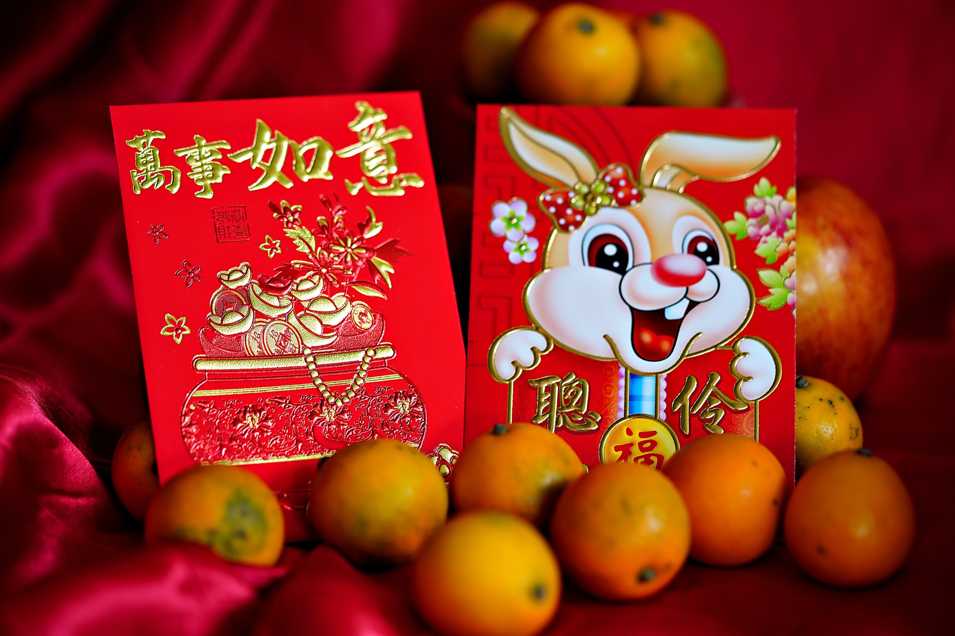 year of the rabbit red envelope and oranges by hartono subagio on pixabay